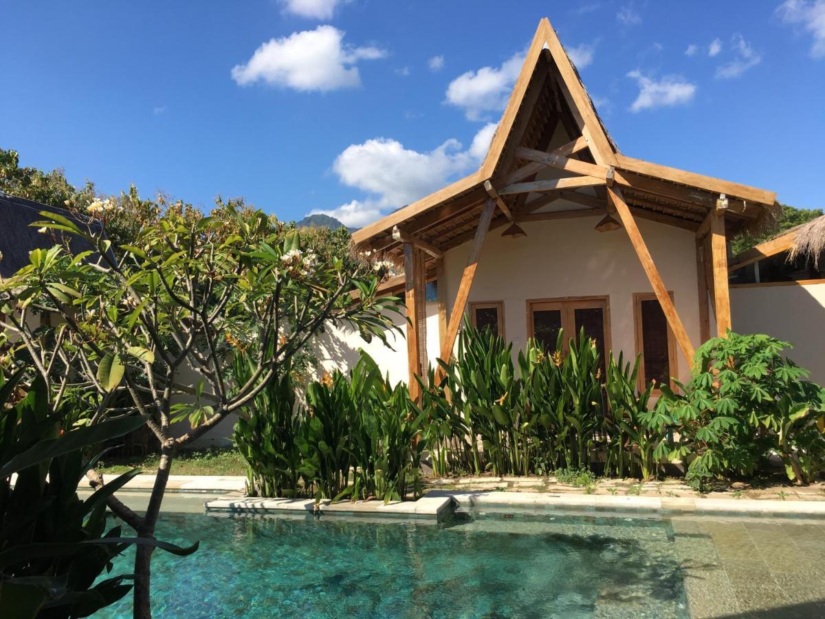 Kalyssa Beach Bungalows เปมูเตรัน ภายนอก รูปภาพ